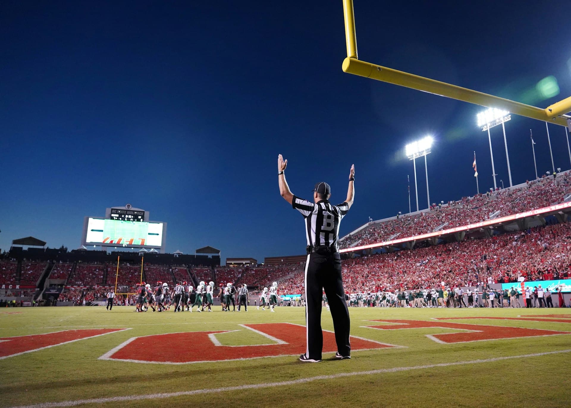 College football player celebrating on the field